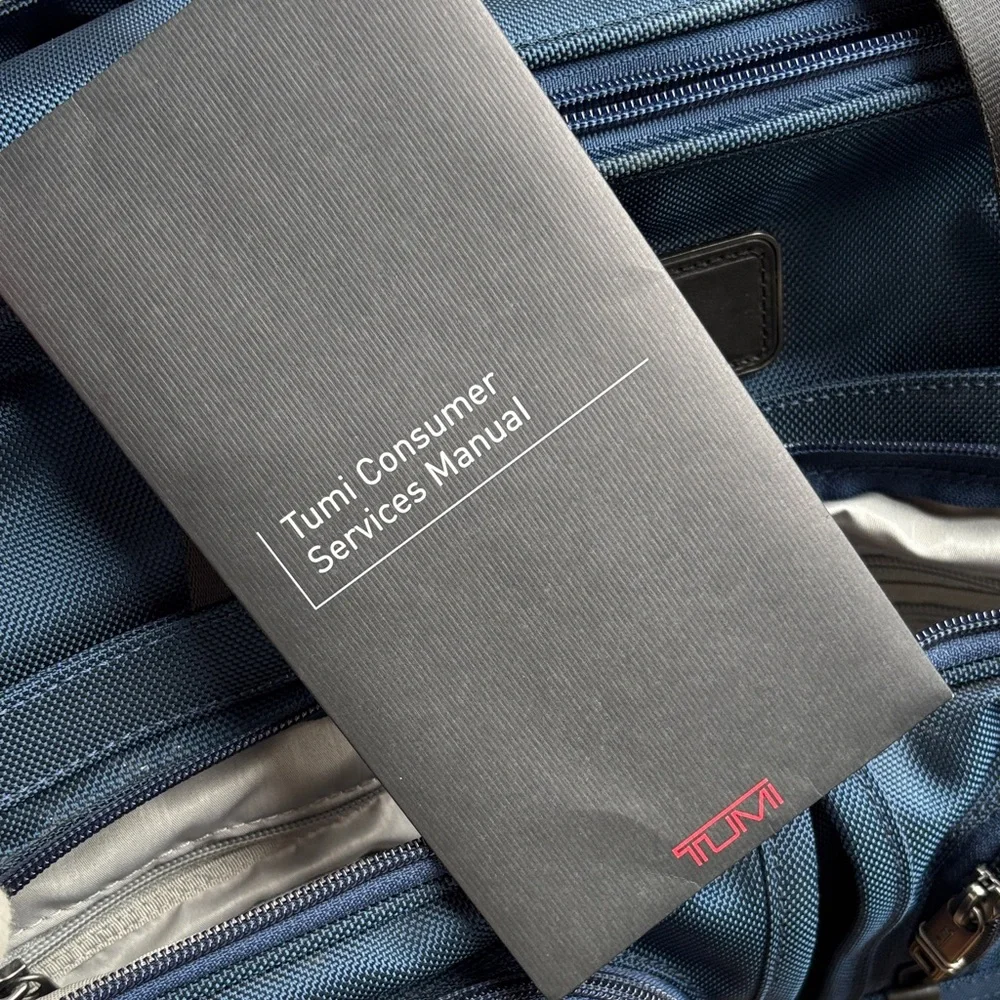 Tumi alpha deluxe carry on satchel in navy blue